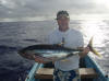 Fergal, lands his first yellow fin tuna, deep sea fishing off aitutaki